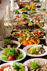 Fototapeta na wymiar table set service with silverware and glass stemware at restaurant before party