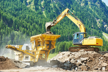 excavator and stone crusher machine