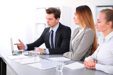 Group of Business people at meeting, focus on blond business woman