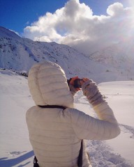 Woman among alpine landscape