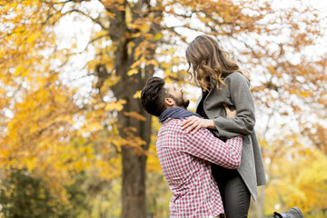 Young couple in the autumn park