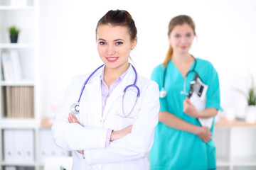 Portrait of young female  doctor in a hospital