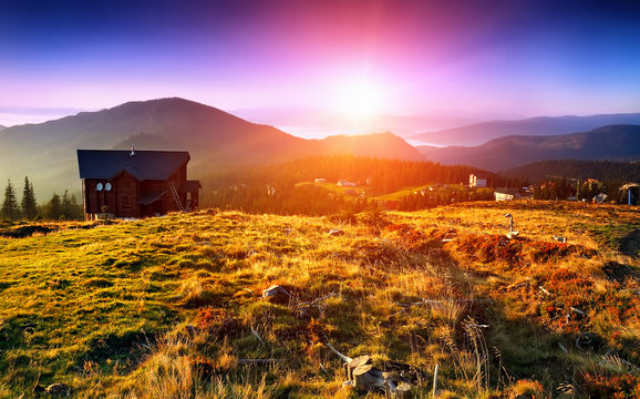 Majestic sunset in the mountains landscape. Dramatic sky. Carpat