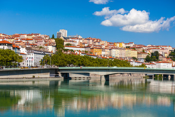 Cityscape of Lyon, France with reflections in the water