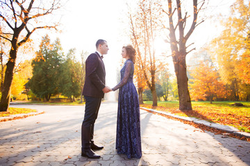 Wedding couple in a forest in the mountains at sunset