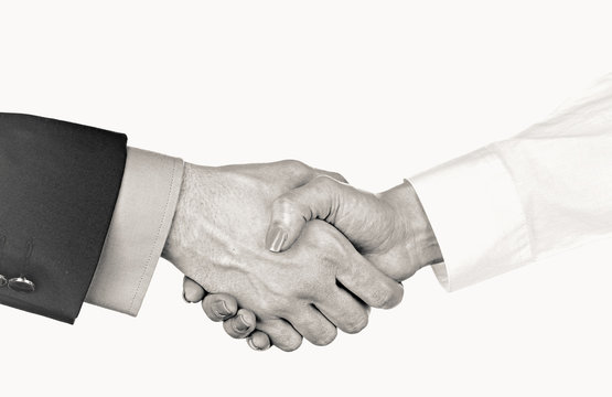 Business handshake, black and white retro stylization