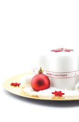White candles with red Christmas ball