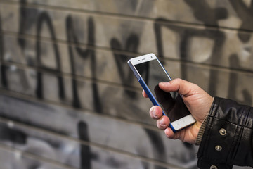 Phone wiht graffiti
