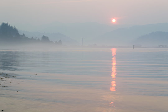 Sunrise over Tillamook Bay, Oregon during the wildfires of Summer 2015.