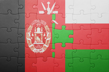 puzzle with the national flag of oman and afghanistan