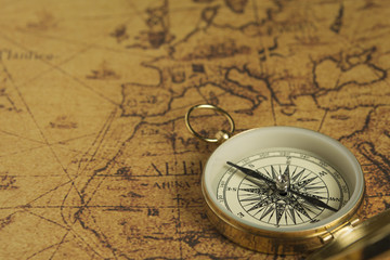 Fototapeta na wymiar Compass on a map