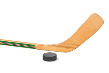 Ice hockey stick and puck