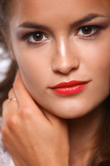 Portrait of young beautiful brunette woman 