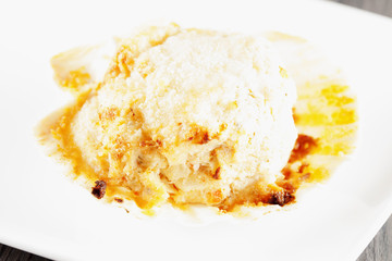 Stuffed scallop over white