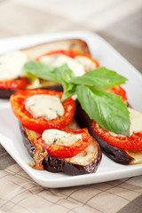 Eggplants with tomato and blue cheese