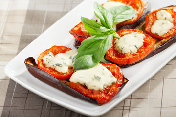 Eggplants with tomato and blue cheese