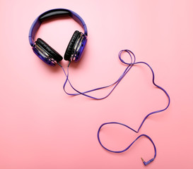 Headphones on pink background