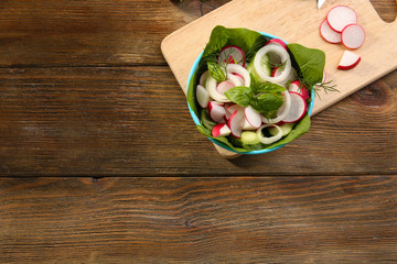 Fresh vegetable salad on table close up