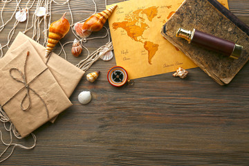 Beautiful composition with sea accessories on table close up