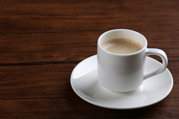 Cup of coffee on table close up