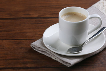 Cup of coffee on table close up