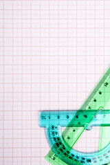 drawing tools on blue graph paper with copy space