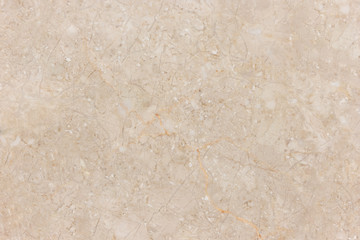 Beige marble stone wall background with natural pattern.