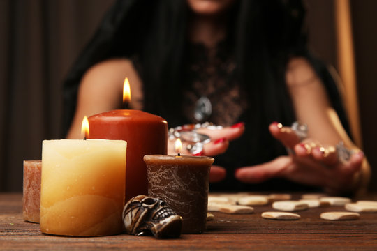 Witch - fortune teller reading fortune close up