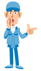 指差して教える作業着の男性