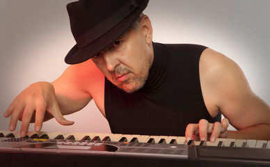 Man playing synthesizer