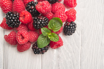 Fresh organic raspberries and blackberries