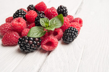 Fresh organic raspberries and blackberries