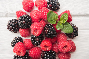 Fresh organic raspberries and blackberries