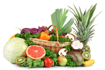 Obraz na płótnie Canvas Juicy fruit and tasty vegetables isolated on white