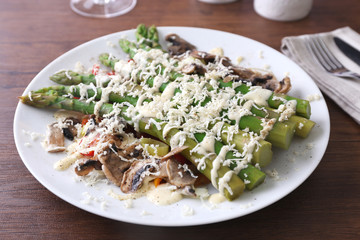 Delicious vegetables dish on served wooden table, close up