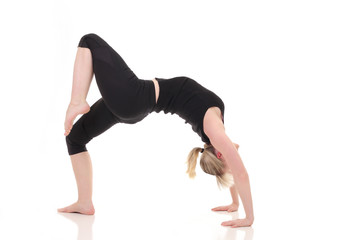Fototapeta na wymiar woman doing yoga exercises on yoga mat