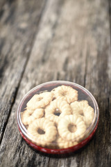 Butter cookies on wood plate