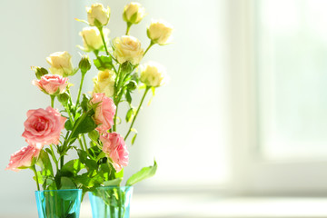 Beautiful spring flowers on soft window background close-up