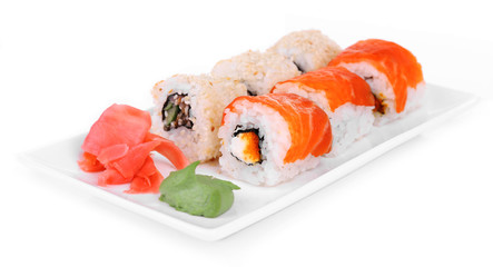 Tasty rolls, ginger and wasabi isolated on white