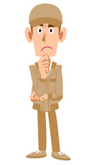 考える作業着の男性