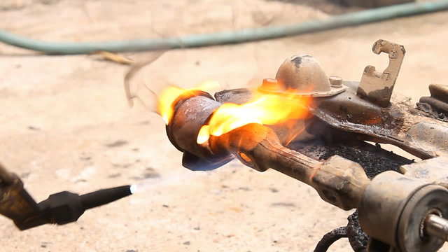 Upper arm bushings removal method by use acetylene gas.