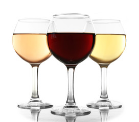 Glasses with white, rose and red wine isolated on white background
