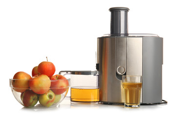 Stainless juice extractor with apples isolated on white background