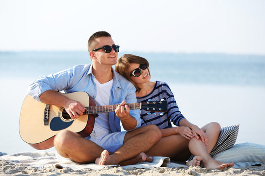 Young couple on the riverside