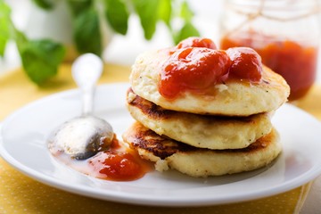 Cottage cheese pancakes, Fritters of cottage cheese. traditional Ukrainian and Russian cuisine.
