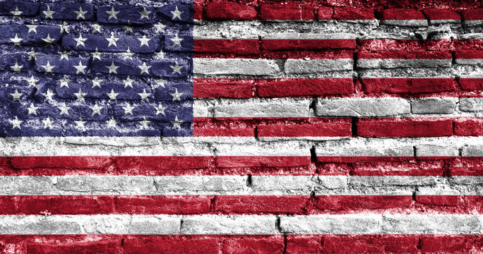 Painted USA flag on brick wall.