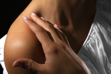 View on woman's neck, collarbone and shoulder, close-up