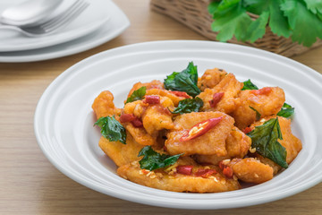 Spicy fried fish with basil (Pad kra prao pla), Thai food style