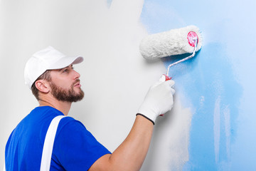painter in white dungarees, blue t-shirt © guerrieroale
