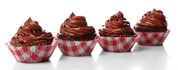 Chocolate cupcakes isolated on white